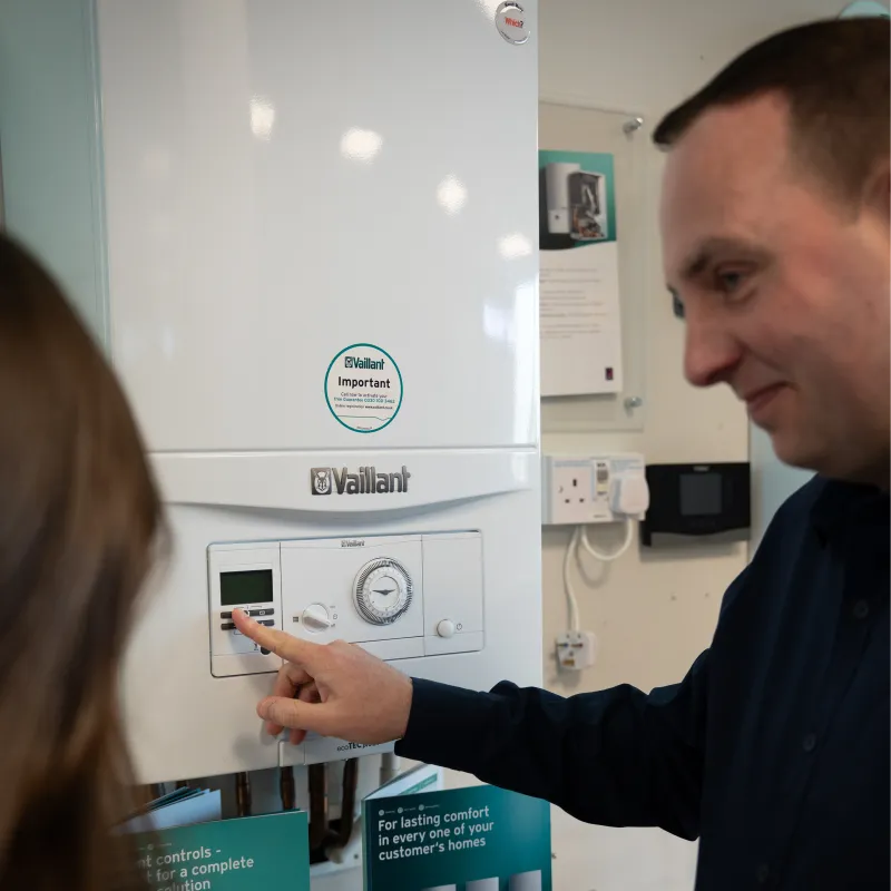 Gas Safe engineer installing a boiler